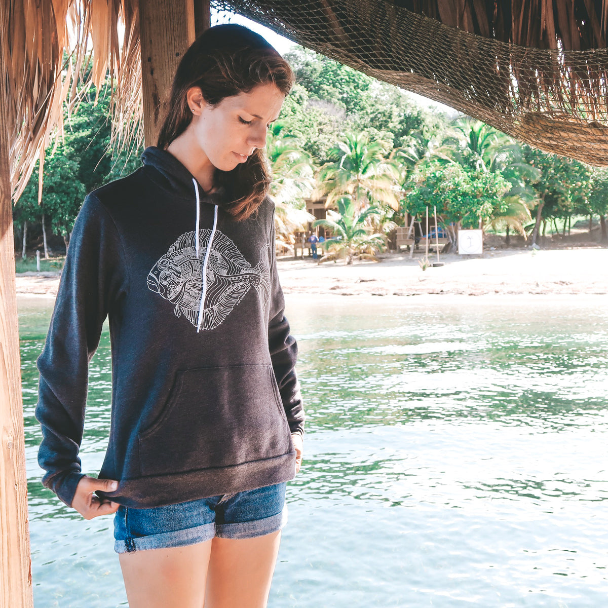 hand drawn alaskan halibut design on a black pullover hoodie