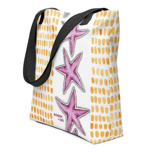 Tote bag with pink star designs and a white background