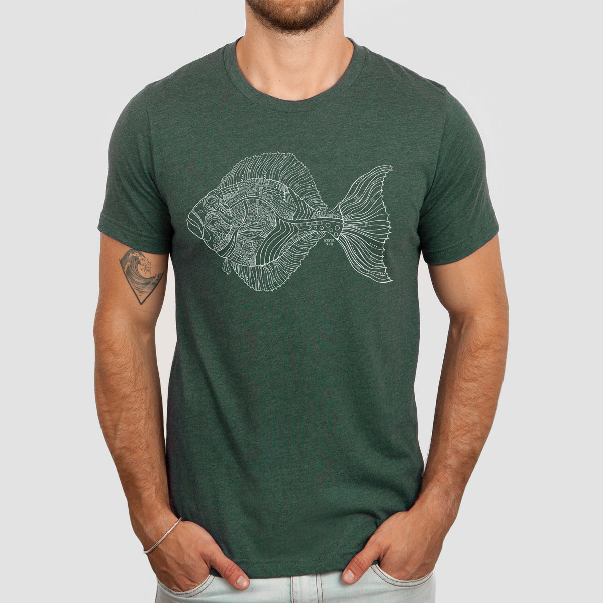 Alaskan halibut design on dark green unisex tee