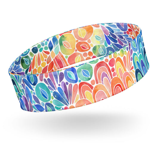 headband featuring a hand painted watercolor rainbow design