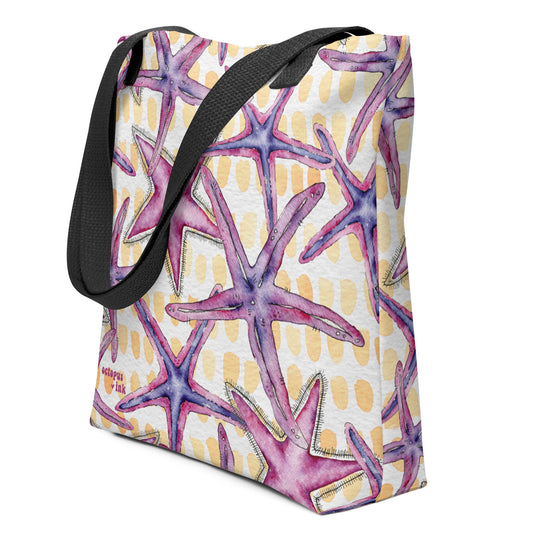 Tote bag with purple starfish pattern on a white background