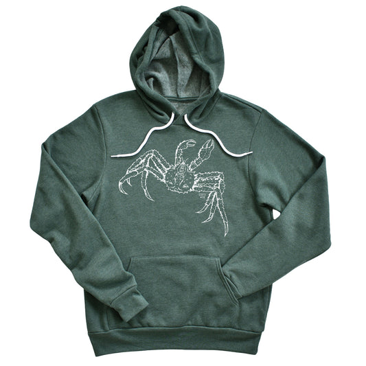 hand drawn alaskan king crab design on a green pullover hoodie