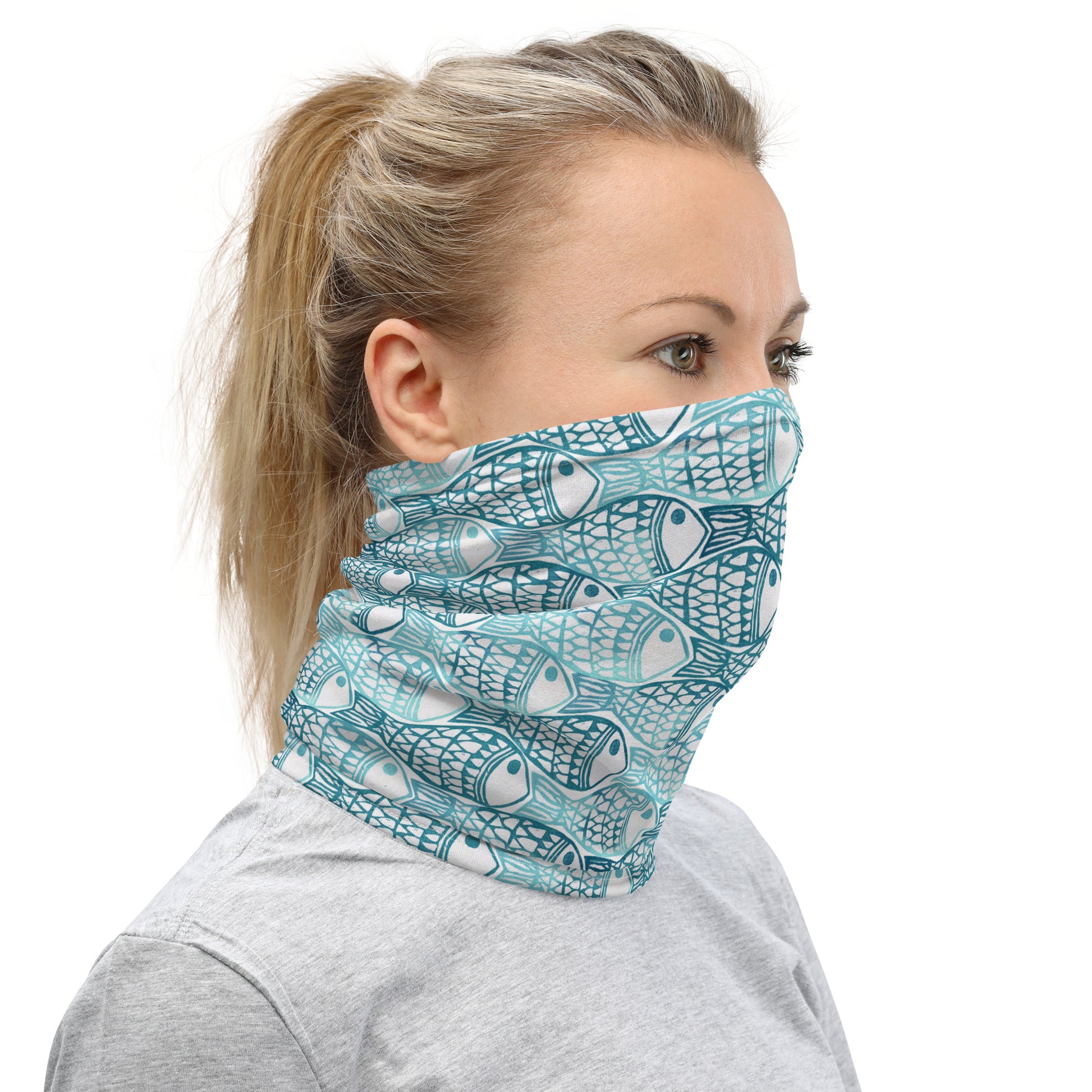 neck gaiter featuring a hand block printed fish design