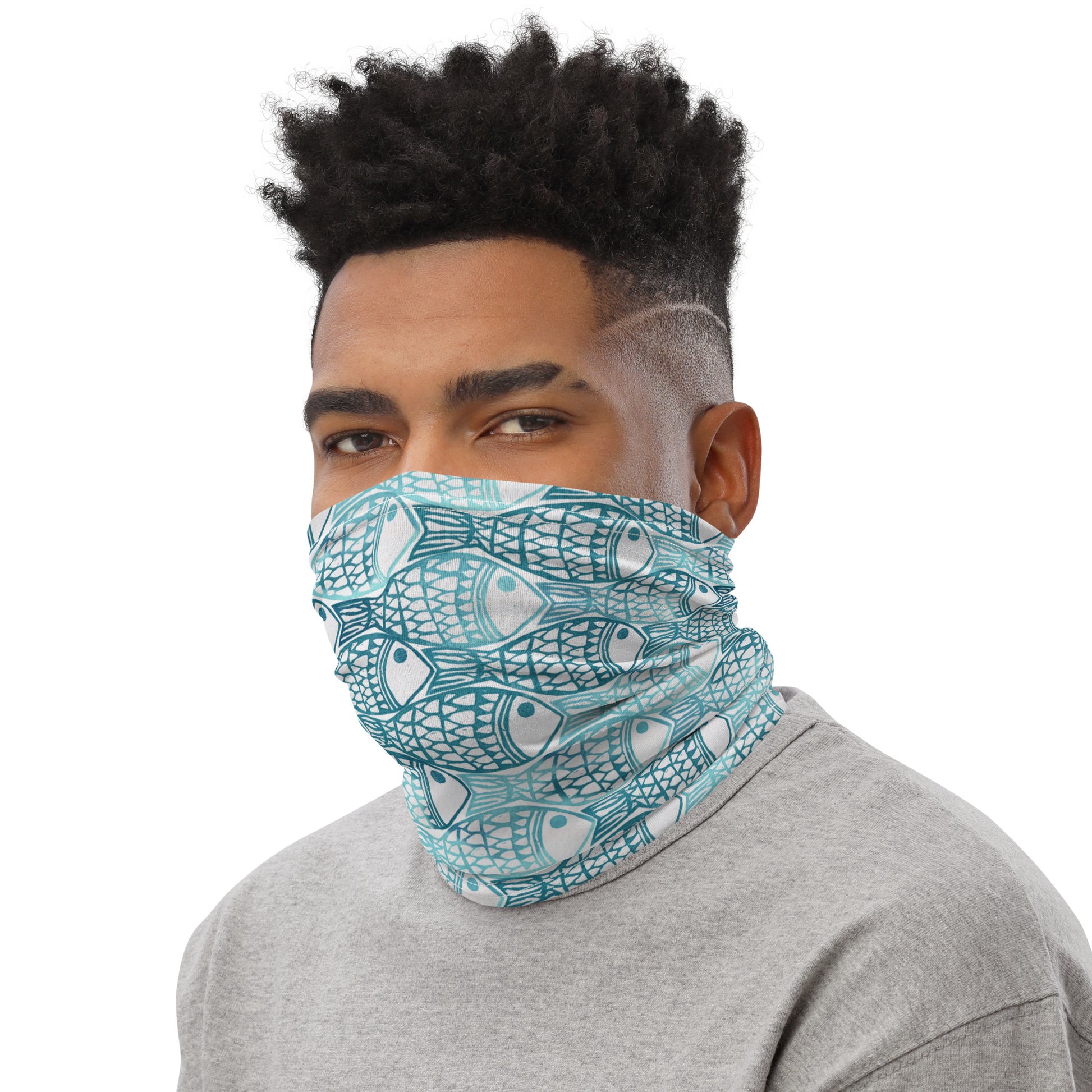 neck gaiter featuring a hand block printed fish design