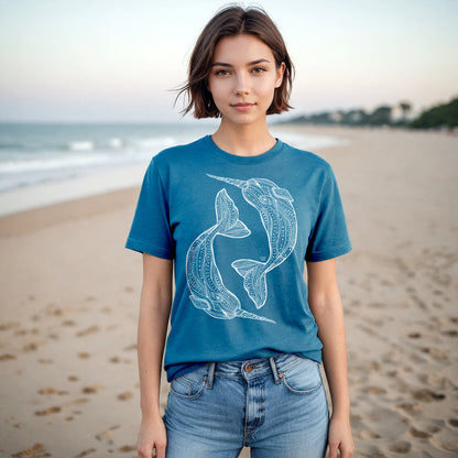 hand drawn narwhal design on teal unisex tee