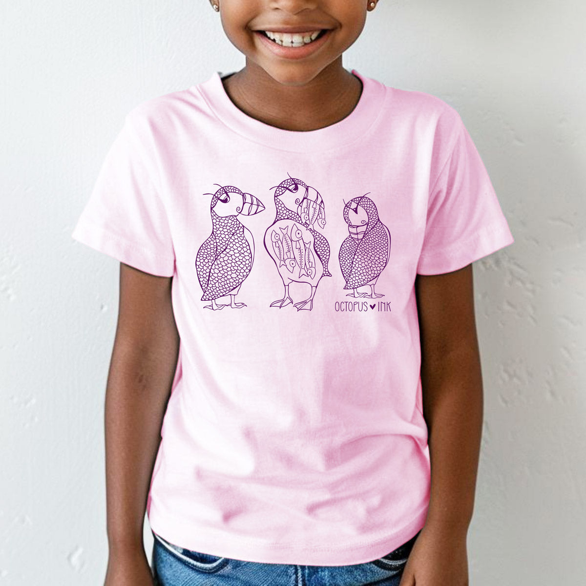 pink toddler tee with hand drawn puffin and fish design