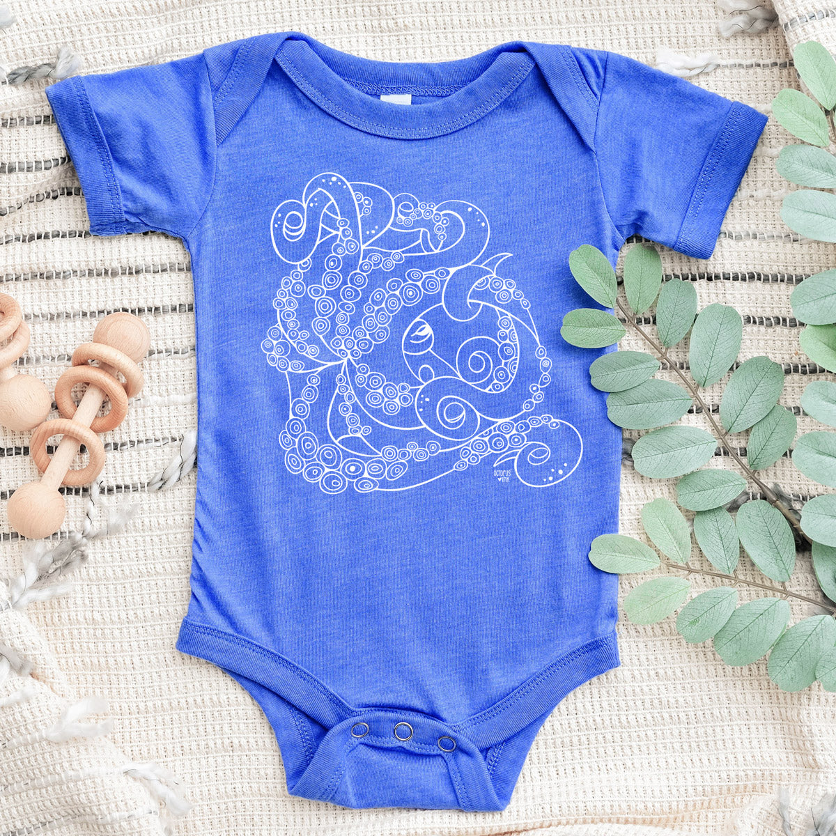 hand drawn octopus design on blue baby bodysuit