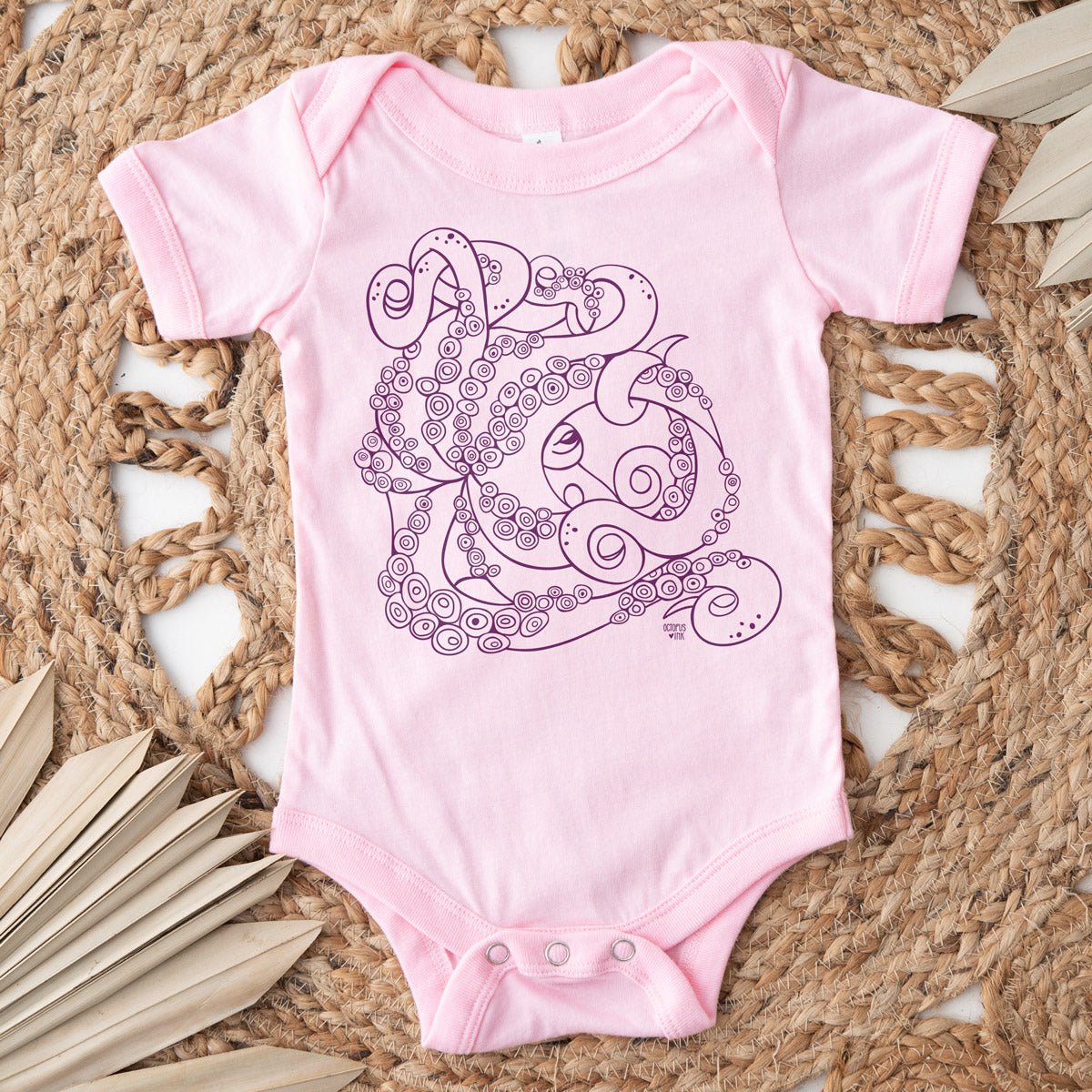 octopus design on pink baby bodysuit