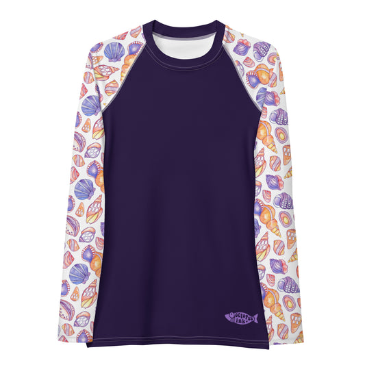 hand painted watercolor shell design in purples and corals on a ladies sun shirt