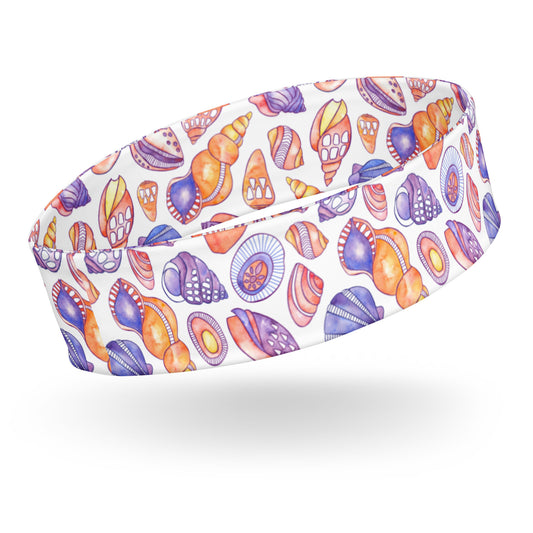 headband featuring a hand painted watercolor design of shells 