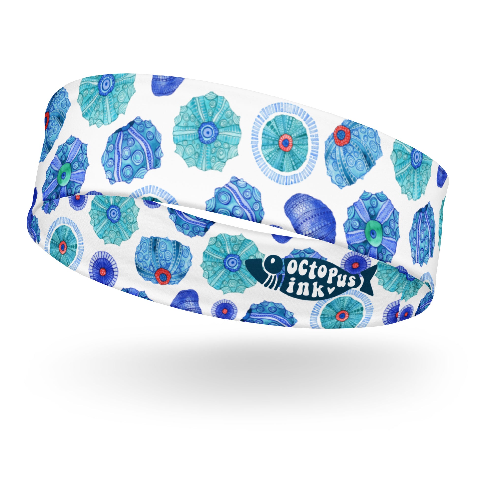 headband featuring a hand painted watercolor design of sea urchins 